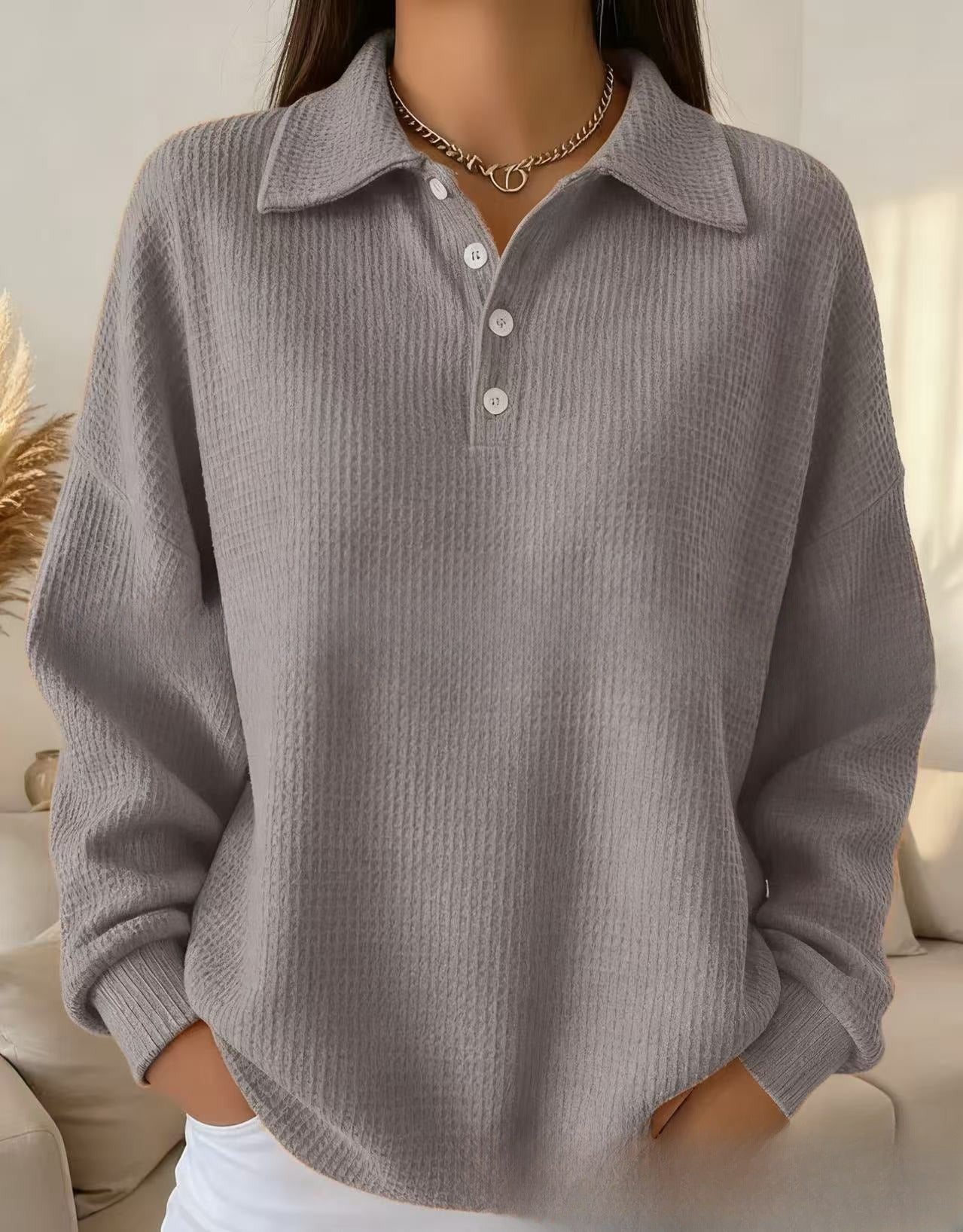 Ensfarvet løs poloshirt med revers og vaflet tekstur, alsidig, langærmet