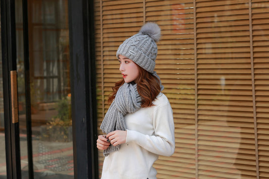 Women knitting wool hat and long scarf