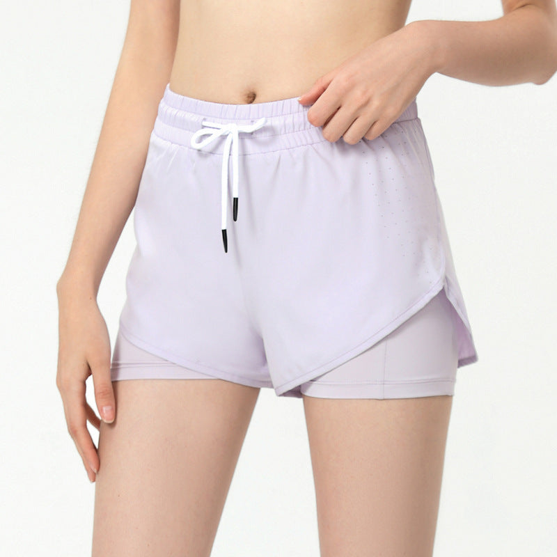 Sportsshorts til kvinder med to-i-én-effekt – forhindrer blottelse