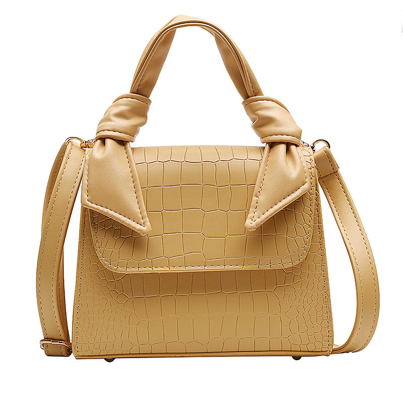 Stone-grained shoulder-slung crossbody bag