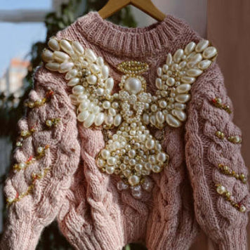 Womens Loose-fitting Pullover Sweater With A Round Neck And Floral Print