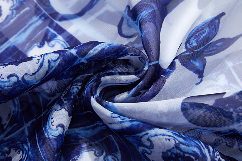 Blue And White Floral Printed Flowing Fairy Dress With Large Swing