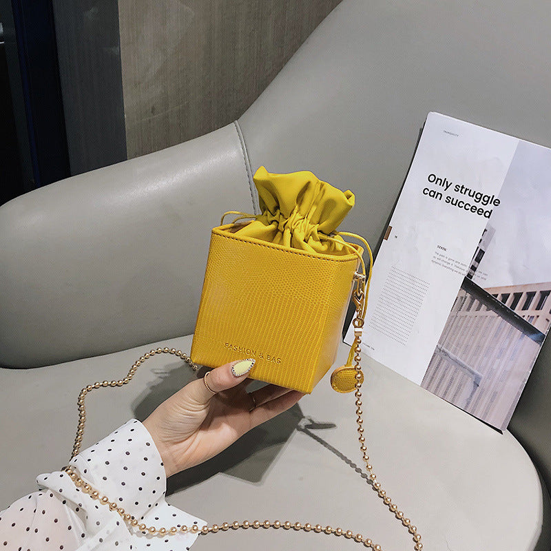 Chain drawstring crossbody bag