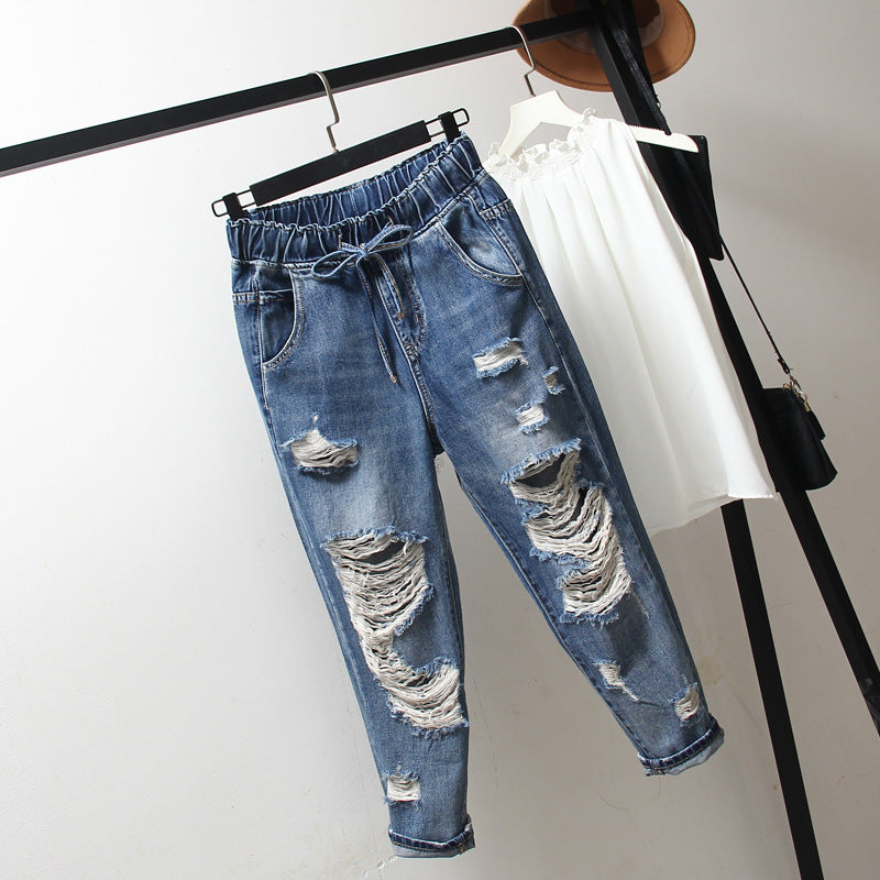 Oversized women's ripped jeans