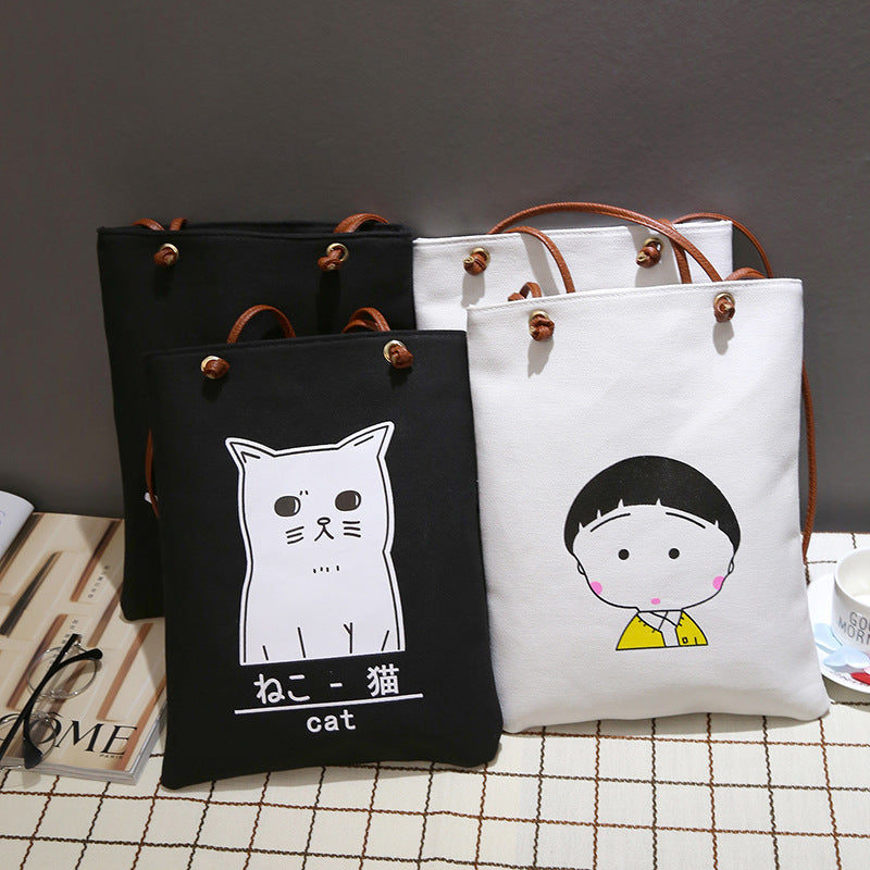 The new Korean alphabet printed Canvas Handbag Shoulder canvas bag student bag female canvas bag cloth female fashion tide