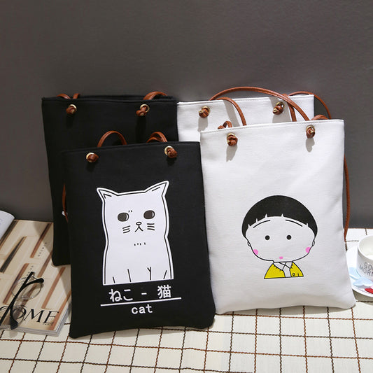 The new Korean alphabet printed Canvas Handbag Shoulder canvas bag student bag female canvas bag cloth female fashion tide