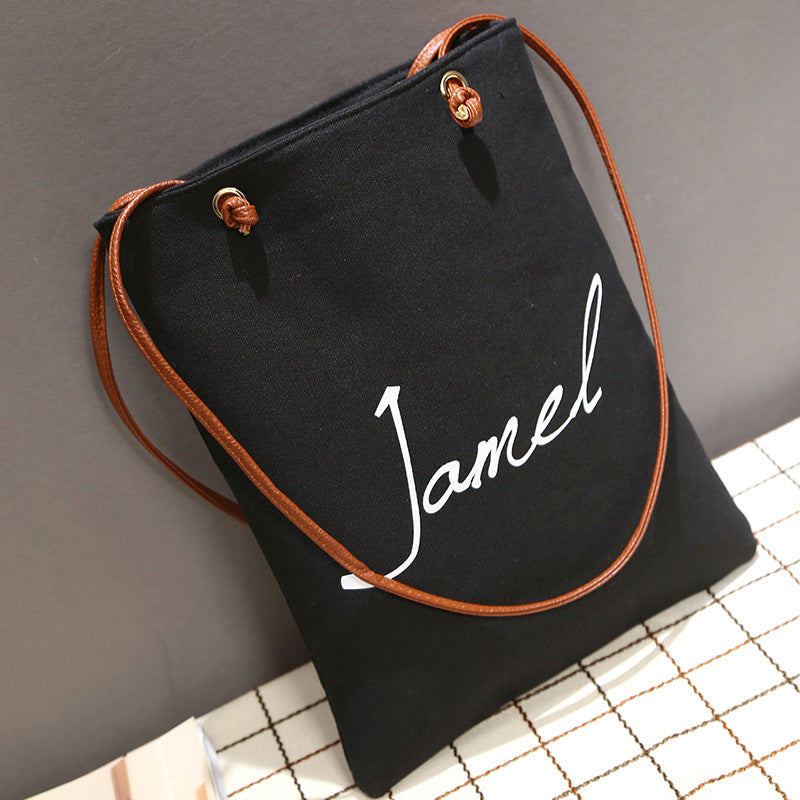 The new Korean alphabet printed Canvas Handbag Shoulder canvas bag student bag female canvas bag cloth female fashion tide