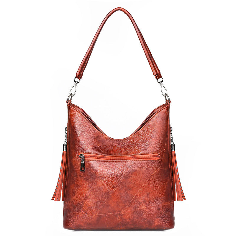 Simple fashion tassel female bag