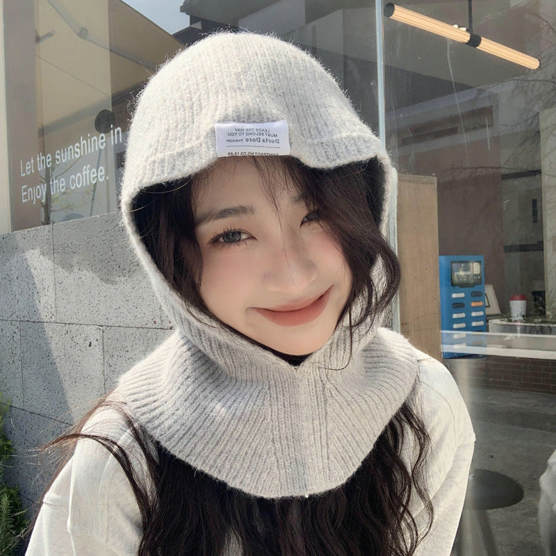 Knit Hat With A Bib