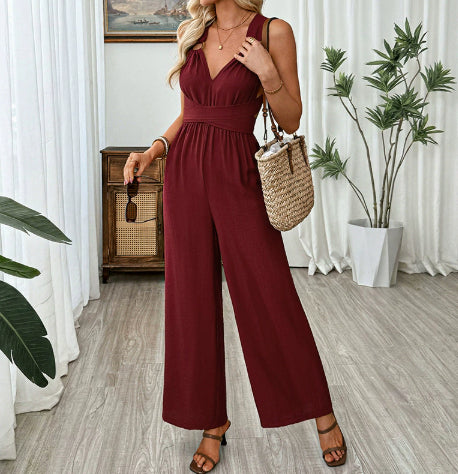 V-udskæring, rygløs, crossover-talje, viddebenet jumpsuit