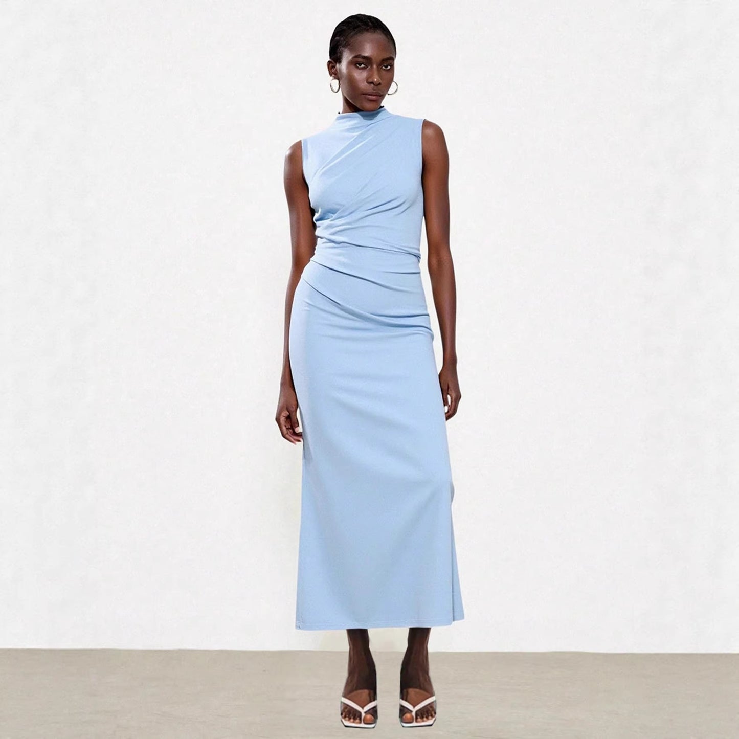 Elegant Sleeveless Slit Dress With A Sophisticated Vibe