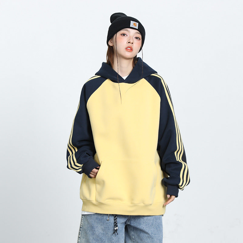 Herre- og dame-stribet kontrastfarve syet raglan-top