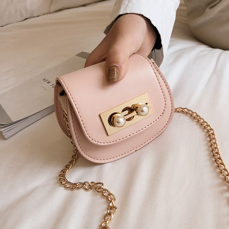 Contrasting mini saddle bag