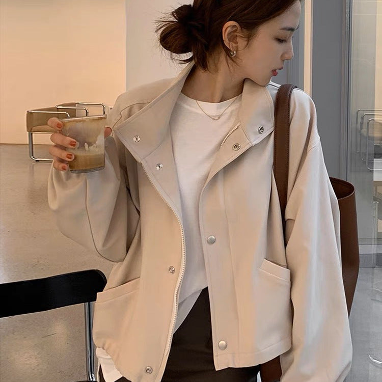 Solid Color Relaxed Fit Top With A Stand Up Collar