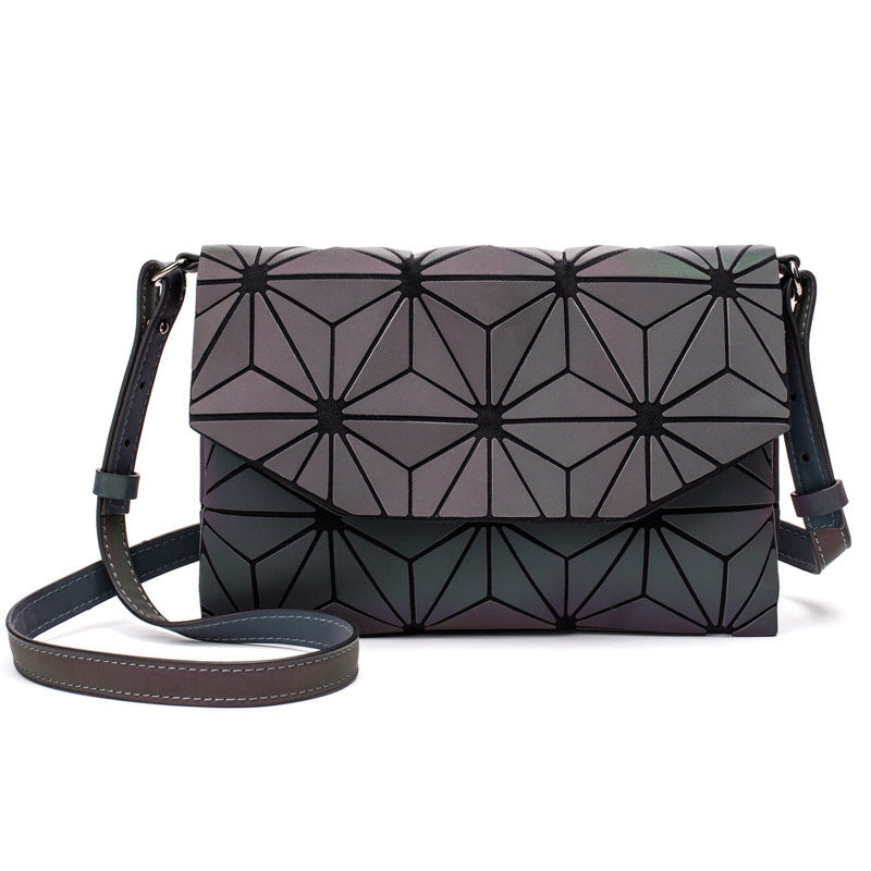 Lysende geometrisk crossbody-taske