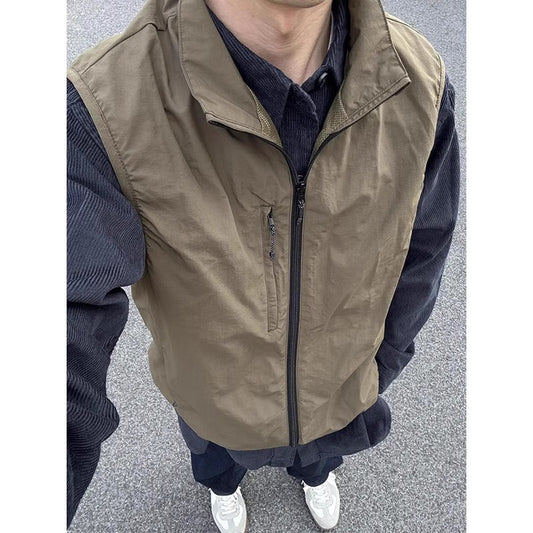 Olive-green Shirt Layered With A Trendy Brand Vest Jacket