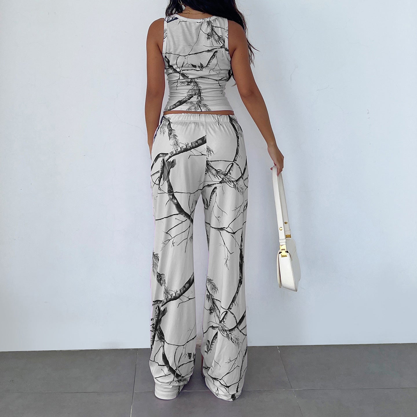 Sleeveless Vest And Drawstring Pants Set With A Printed Design