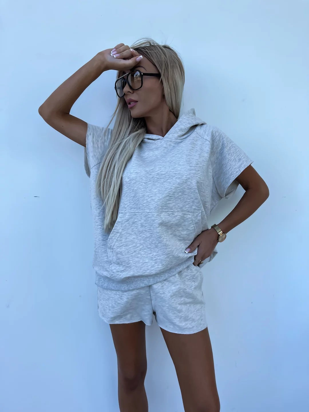 Casual, Relaxed-fit Hoodie With A Hood And Pockets Paired With Elastic Waist Shorts