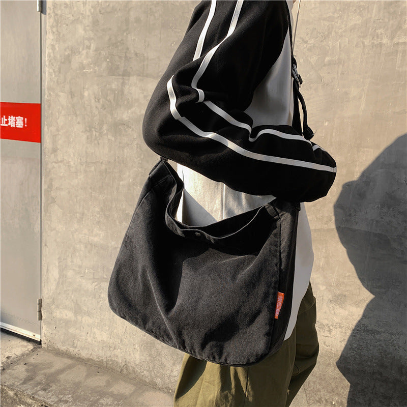Studerendes bløde denimbudgetaske