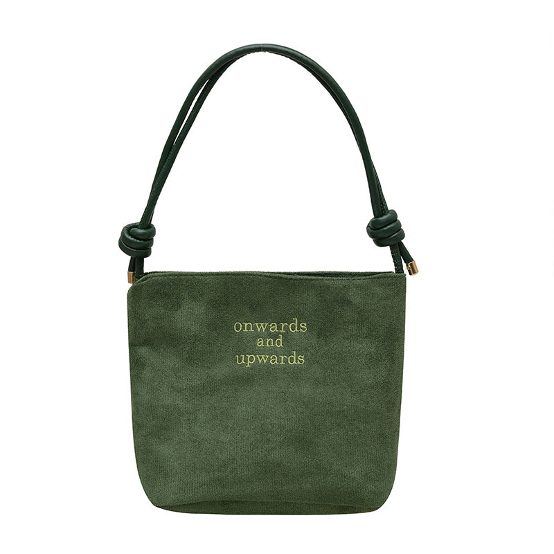 Ny skuldertaske i vintage ruskind til kvinder – en supertrendy must-have bucket-taske