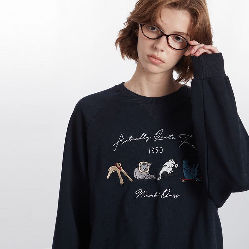 Rundhalset Løs Retrosweater Med Broderet Design Og Lange Ærmer