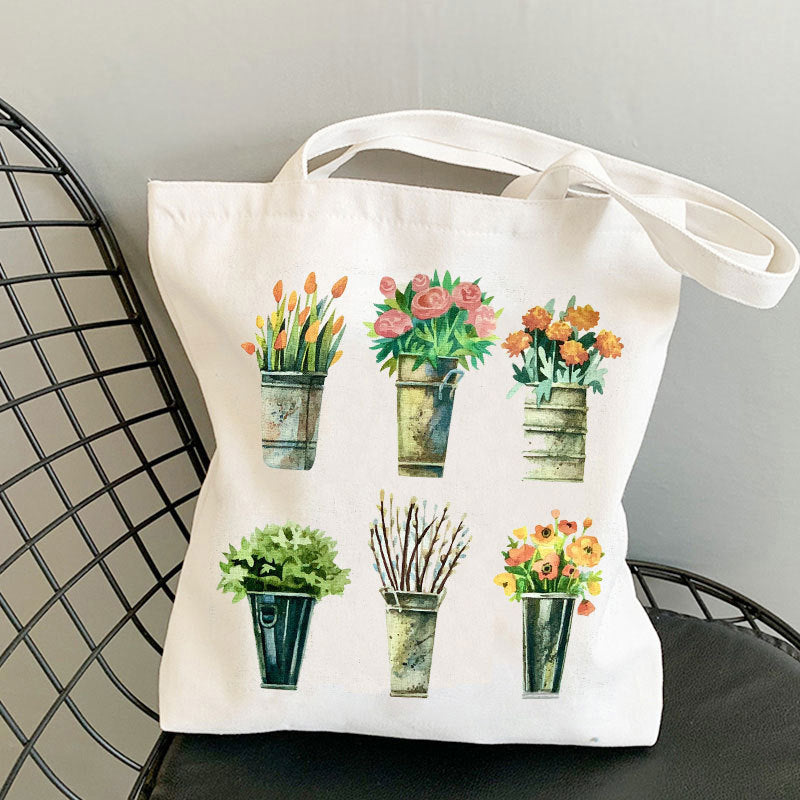 Trykt skuldertaske med foldet design