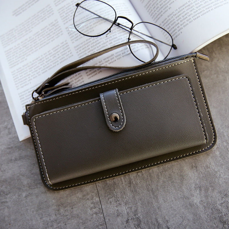 The new spring and summer women's long simple multifunctional hand clasp zipper zipper multi Card Wallet students