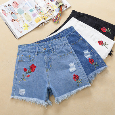 Rose white ripped jeans