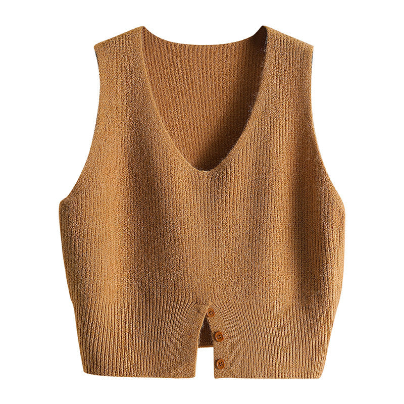 Lagdel en sweater over en vest og tag en strikket vest med V-udskæring på
