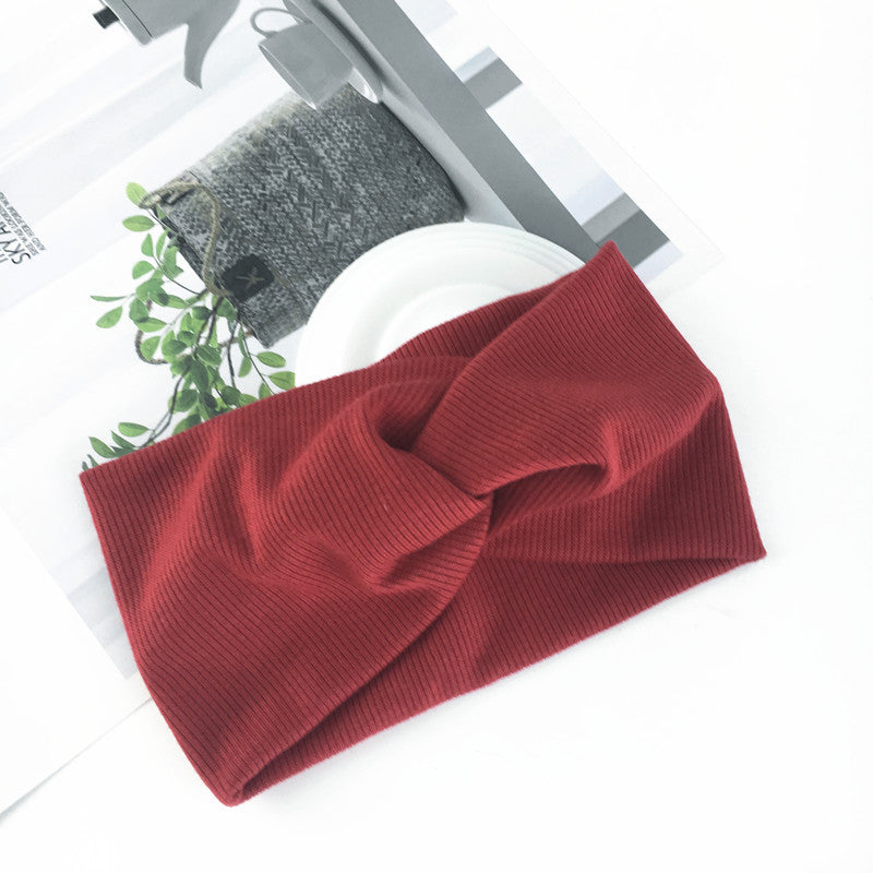 Wide side stretch knitted headband