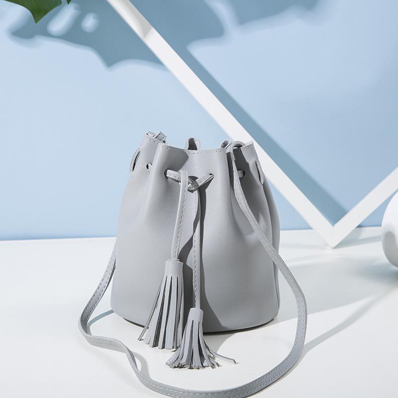 Women's fashion match color consistent wine rubber rope bucket bag