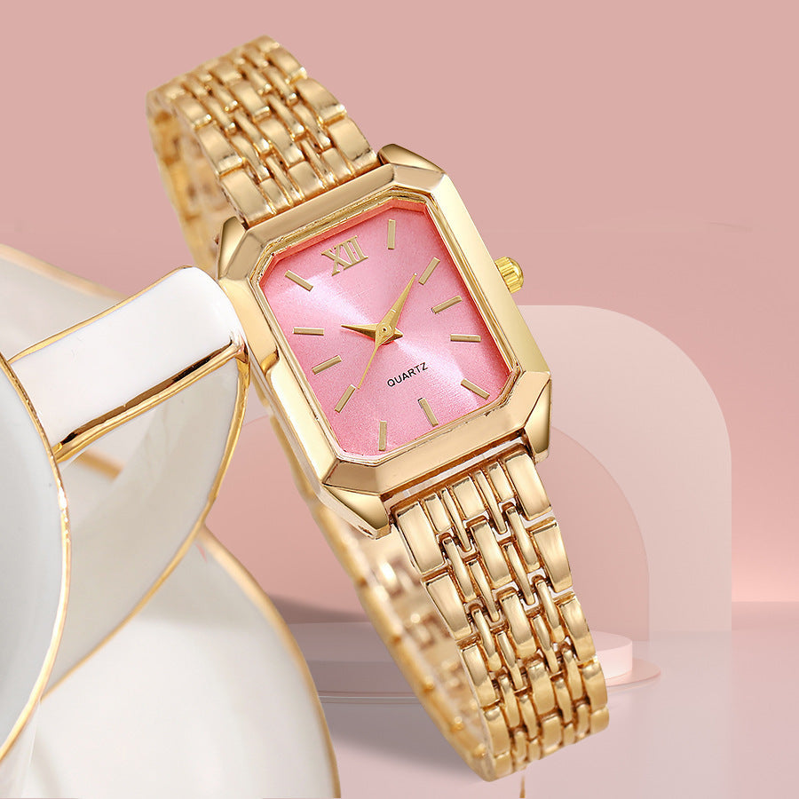 The Lady Is Just Wearing A Square Quartz Watch