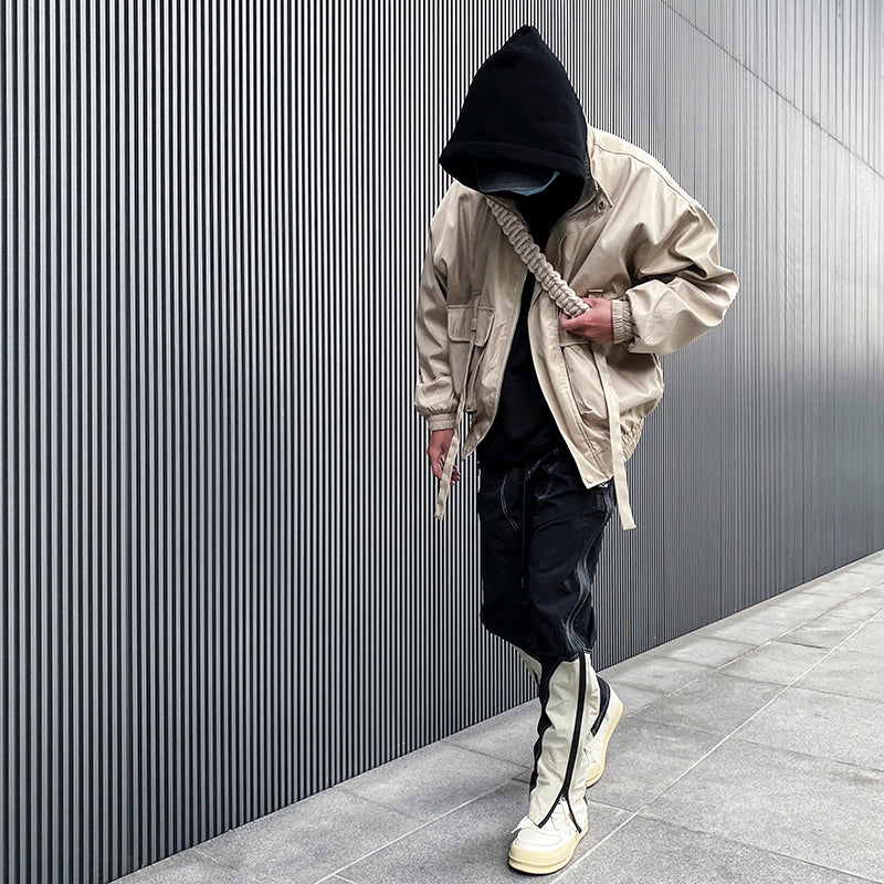 Nylon trenchcoat med store lommer og stropper