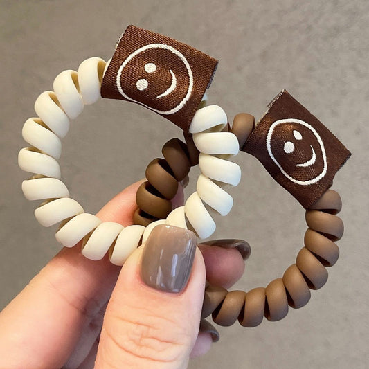 Den nye mælkete-farve frosted matte hårcirkel, smiley ansigtshårbånd, pigehårelastik