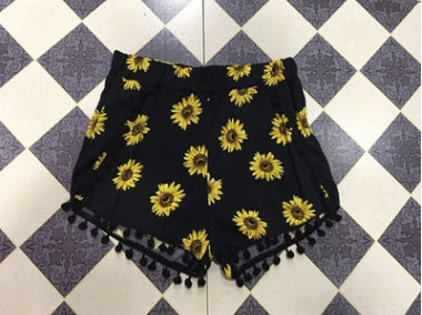Europæisk og amerikansk udenrigshandel, sommernyhed, dame shorts med pomponer og solsikkeprint, elastisk talje, strandshorts