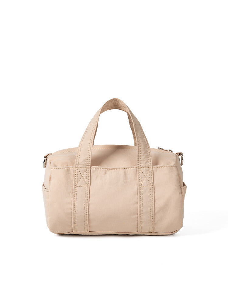 Letvægts casual crossbody pudetaske med stor kapacitet