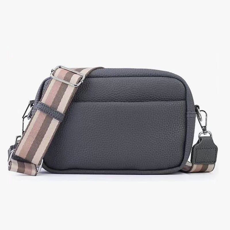 Crossbodytaske med bred skulderrem
