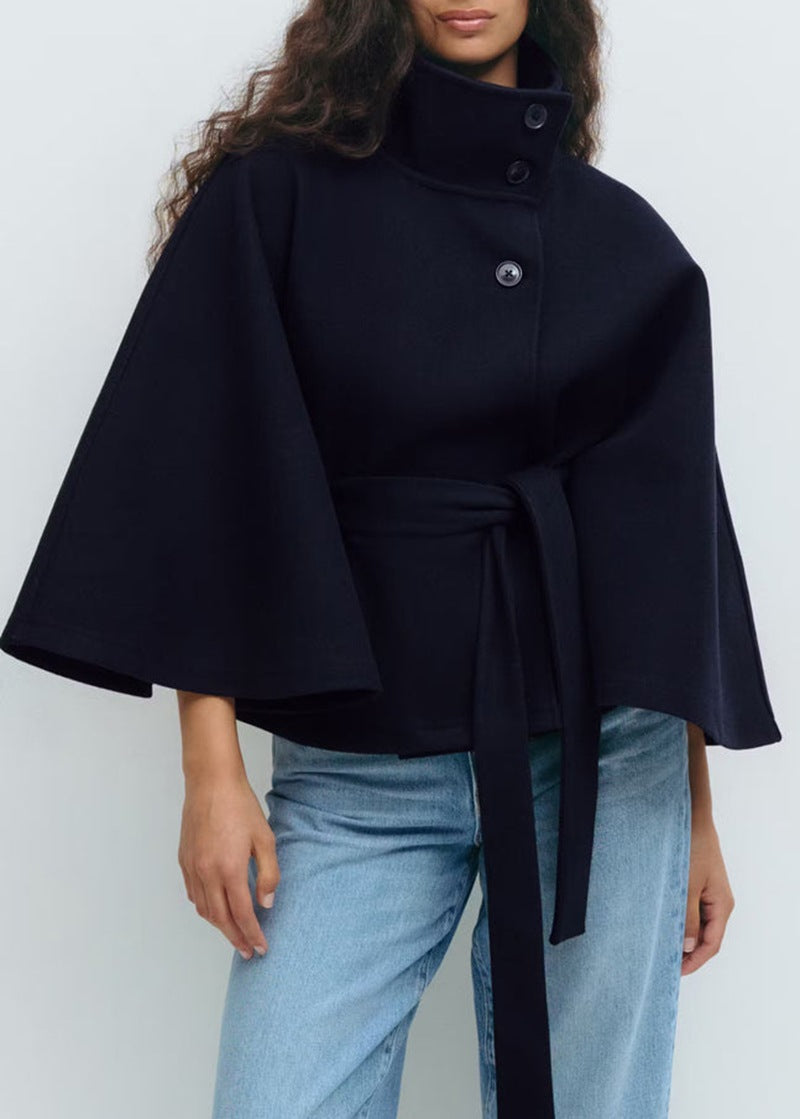 Trench Coat With A Stand-up Collar Buttons And A Belt