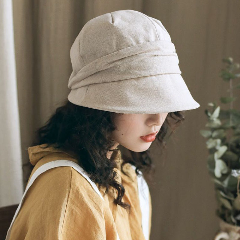 Kunstnerisk afslappet bøllehat med top og krøllet vintage-look