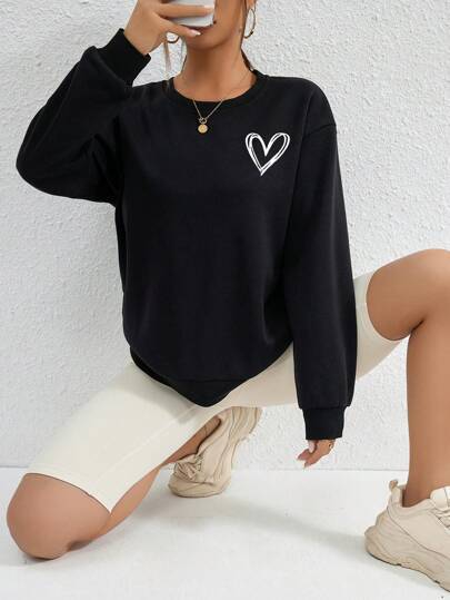 Hjerteformet printet sweatshirt med sænkede skuldre