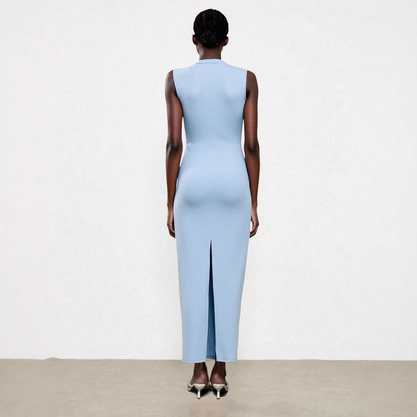 Elegant Sleeveless Slit Dress With A Sophisticated Vibe