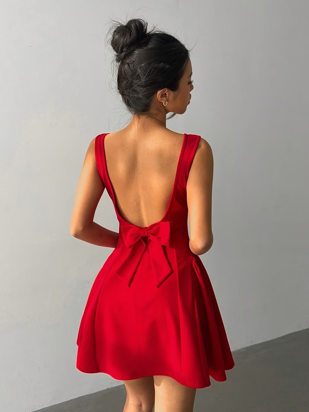 Elegant Red Evening Gown With A Bold Open Back Sleeveless Spaghetti Strap A Line Dress