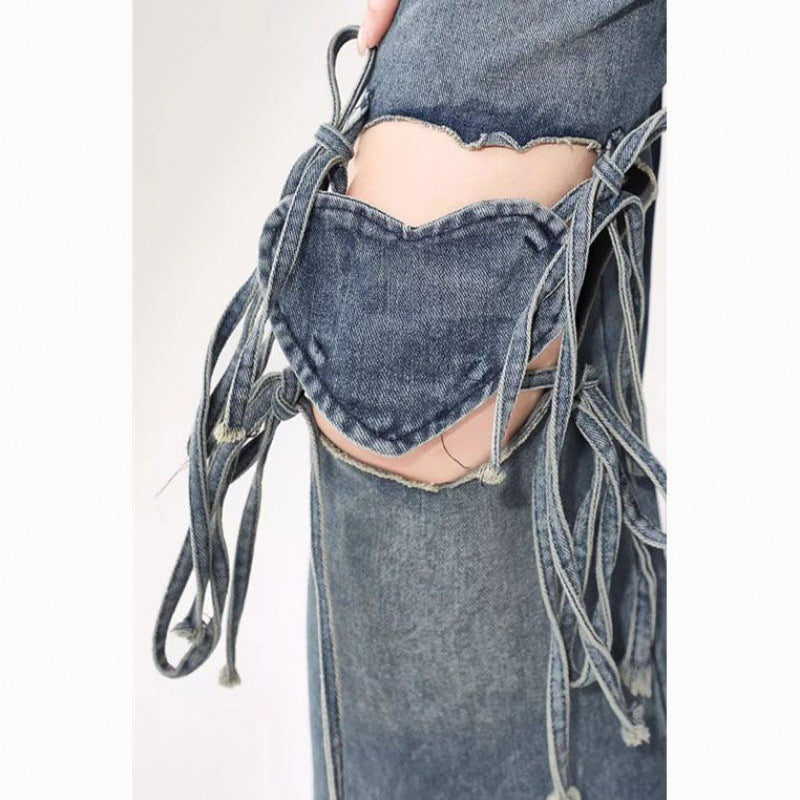Damehøjtaljede jeans med kærlighedsremdesign