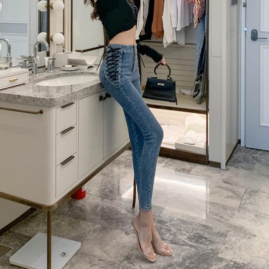 High-rise lace-up jeans