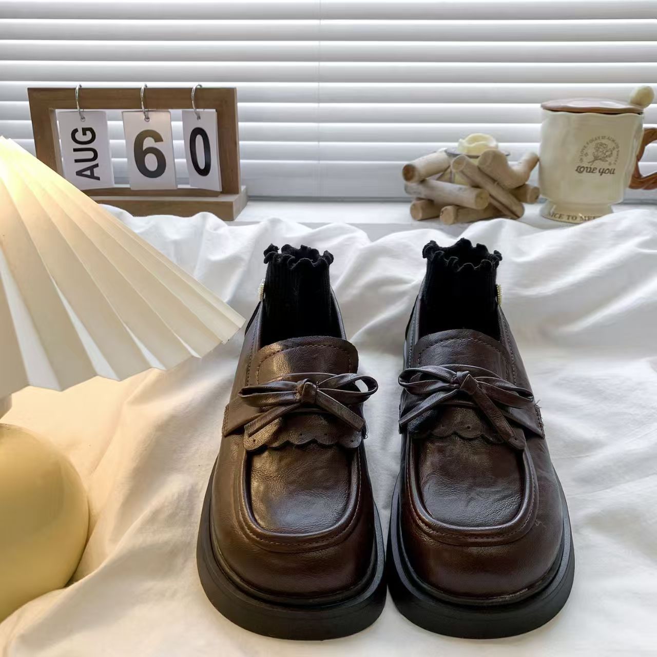 Bow Tie Black Chunky Soled Slip On Leather Shoes