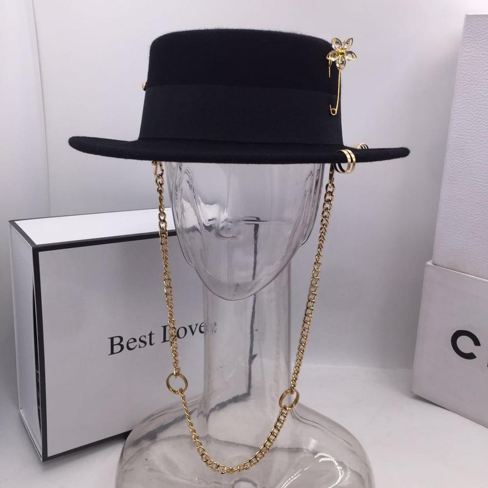 Female retro black top hat