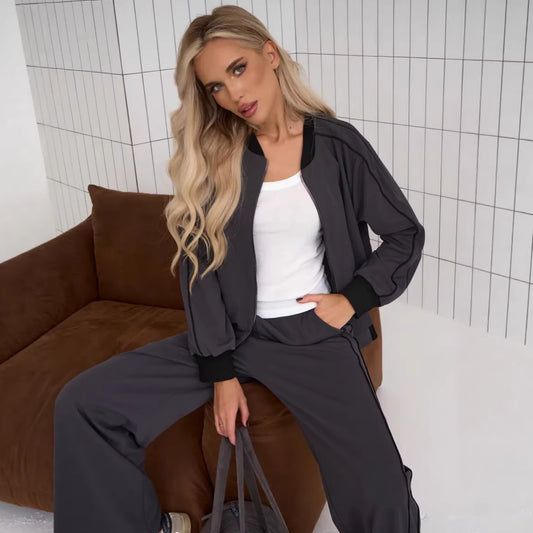 Two Piece Set Featuring A Color Blocked Cardigan With Zippers And Matching Pants