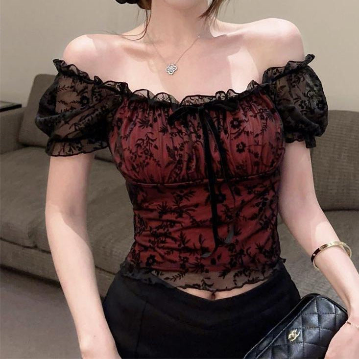 Sultry, Fashion-forward Lace Off-shoulder Top With A Delicate Bow Detail