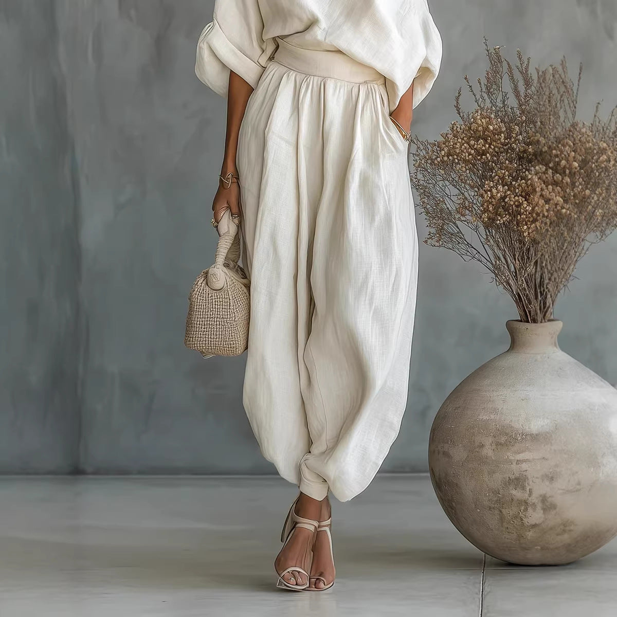 Ensfarvet elegant off-shoulder top og løse bukser todelt sæt til kvinder