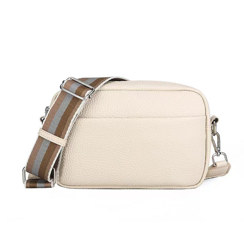 Crossbodytaske med bred skulderrem